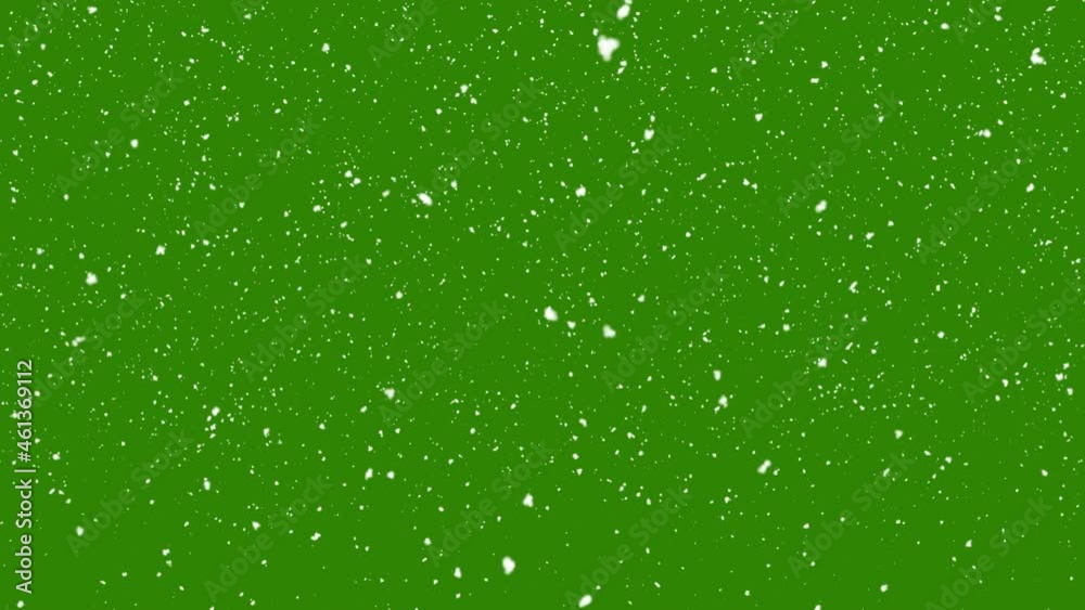 Snow falling on green background Snow falling on green background