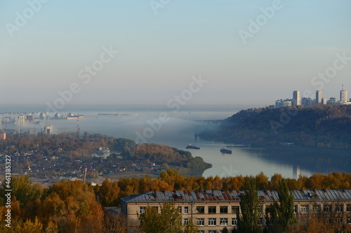 Autumn landscape. Autumn fog over the river. Nizhny Novgorod Oka river.