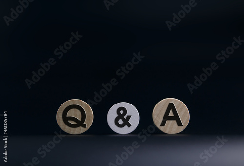 Q and A question and answer symbols on wooden blocks FAQ. for educational ideas with copy space