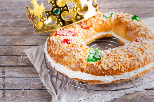 Traditional Spanish Epiphany cake, Roscon de Reyes with festive decorations  photo