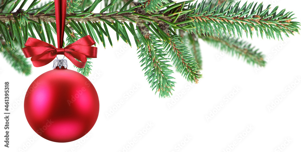 Red Christmas ball with red bow are on the Christmas tree branch as a symbol of Christmas or New Year mystery. Red Christmas ball with red bow are on the Christmas tree branch as a symbol of Christmas or New Year mystery.