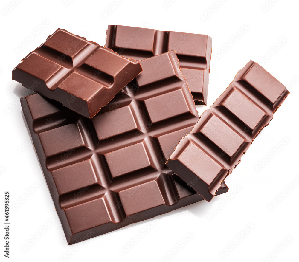Pieces of dark chocolate bar isolated on white background. Sweet food is made of cocoa and sugar.