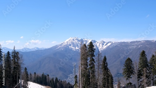 picturesque landscape of mountainous area, coniferous forest of foggy sky at Krasnaya Polyana in Sochi, Russia