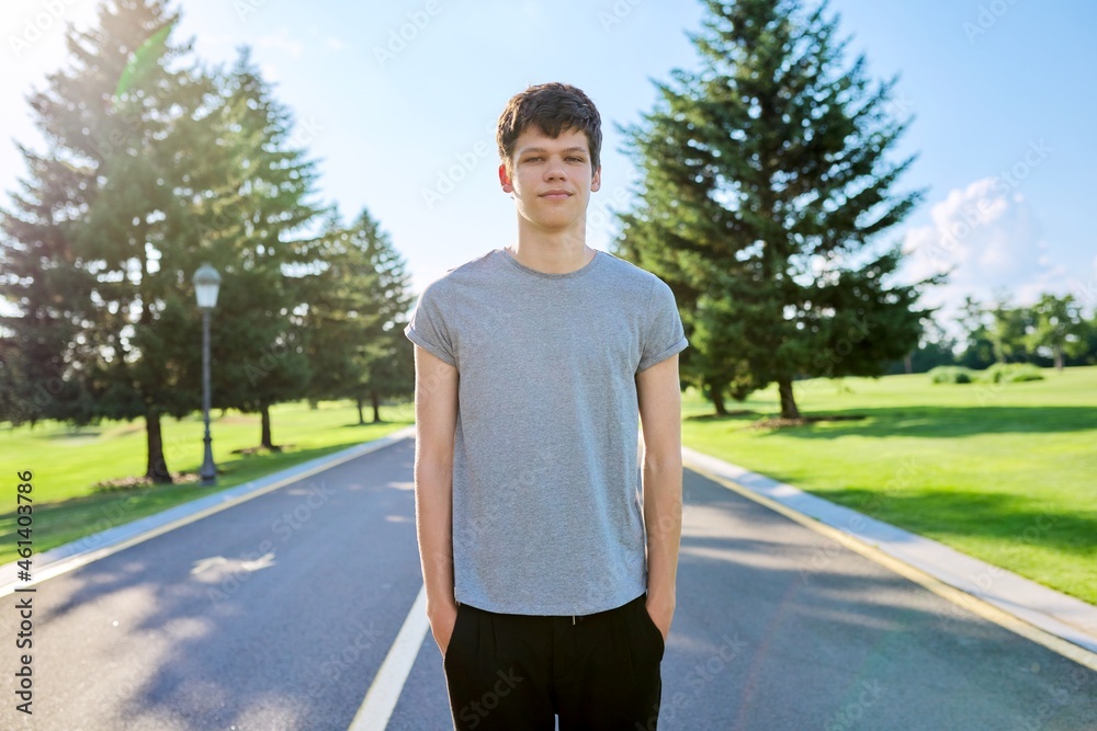 Portrait of a smiling male teenager looking at the camera Portrait of a smiling male teenager looking at the camera