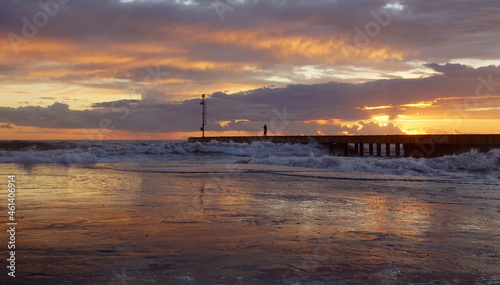 Принти на полотні pier in the sunset with reflections at cinquale of montignoso near massa in nort