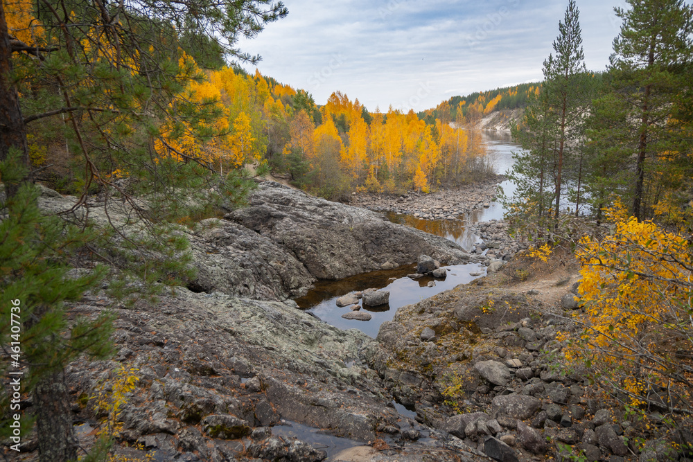 Obraz premium Remains of the most ancient on the earth volcano Girvas in Karelia in autumn, Russia