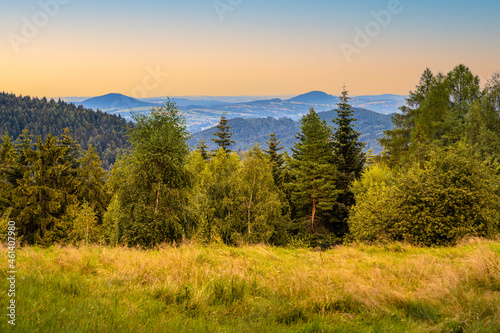 Fototapeta Naklejka Na Ścianę i Meble -  Panoramic view of Beskidy Mountains seen from path to Potrojna peak from Targanice village on northern slope of Little Beskids in Lesser Poland