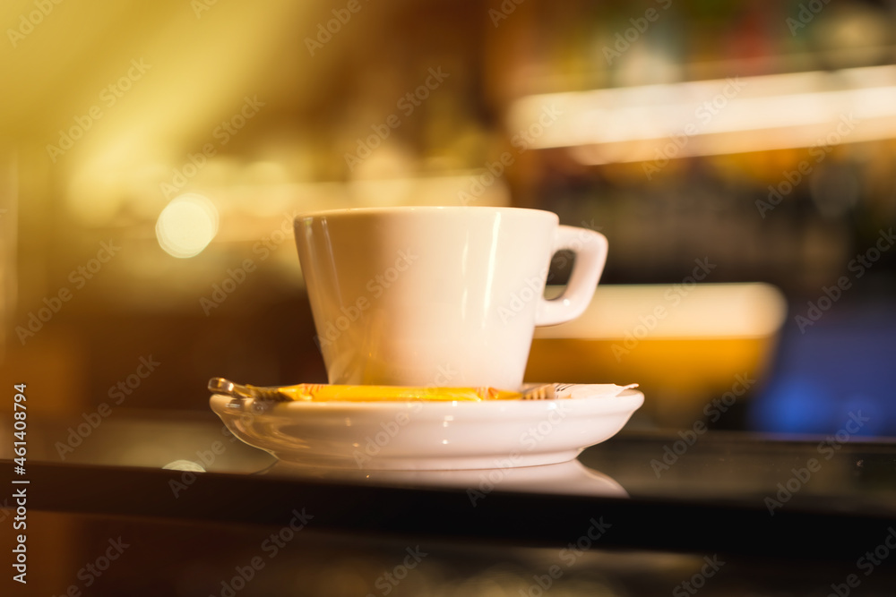 Coffee machine putting a decaf in a white cup