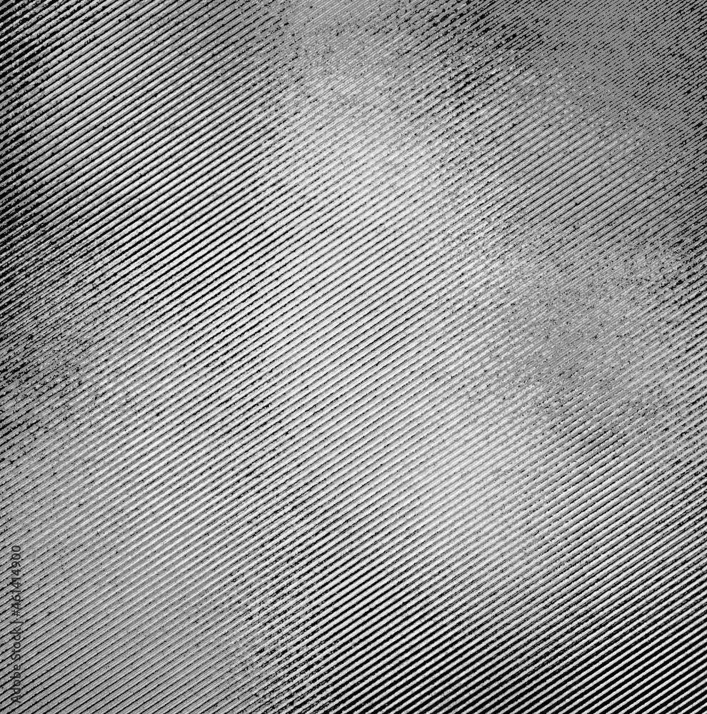 White grunge background. Gray frayed stripes on a black background. White grunge background. Gray frayed stripes on a black background.