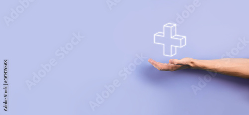 Businessman, man hold in hand offer positive thing such as profit, benefits, development, CSR represented by plus sign.The hand shows the plus sign