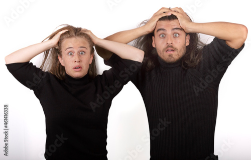 Retrato de pareja, Mujer y hombre con gestos expresivos  divertidos en fondo blanco photo