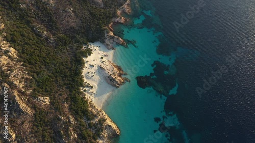 View from above, stunning aerial view of Spargi Island with Cala Soraya, a white sand beach bathed by a turquoise water. La Maddalena archipelago National Park, Sardinia, Italy.	