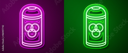 Glowing neon line Paint spray can icon isolated on purple and green background. Vector