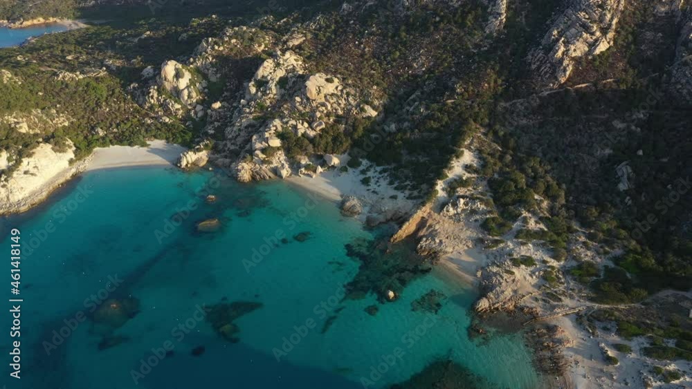 View from above, aerial shot, stunning view of Spargi Island with Cala Corsara, a white sand beach bathed by a turquoise water. La Maddalena archipelago National Park, Sardinia, Italy. View from above, aerial shot, stunning view of Spargi Island with Cala Corsara, a white sand beach bathed by a turquoise water. La Maddalena archipelago National Park, Sardinia, Italy.