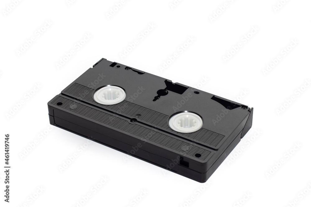 A VHS video cassette with logos/trademarks removed.Isolated on white background.Retro concept. A VHS video cassette with logos/trademarks removed.Isolated on white background.Retro concept.