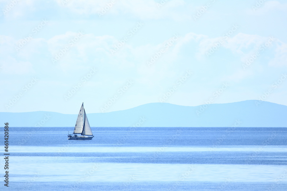 Sailing boat on the sea in beautiful sunny day