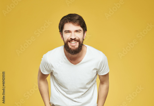 emotional man in a white t-shirt irritated facial expression close-up