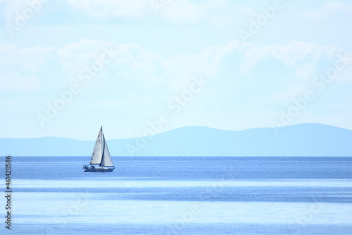 Sailing boat on the sea in beautiful sunny day