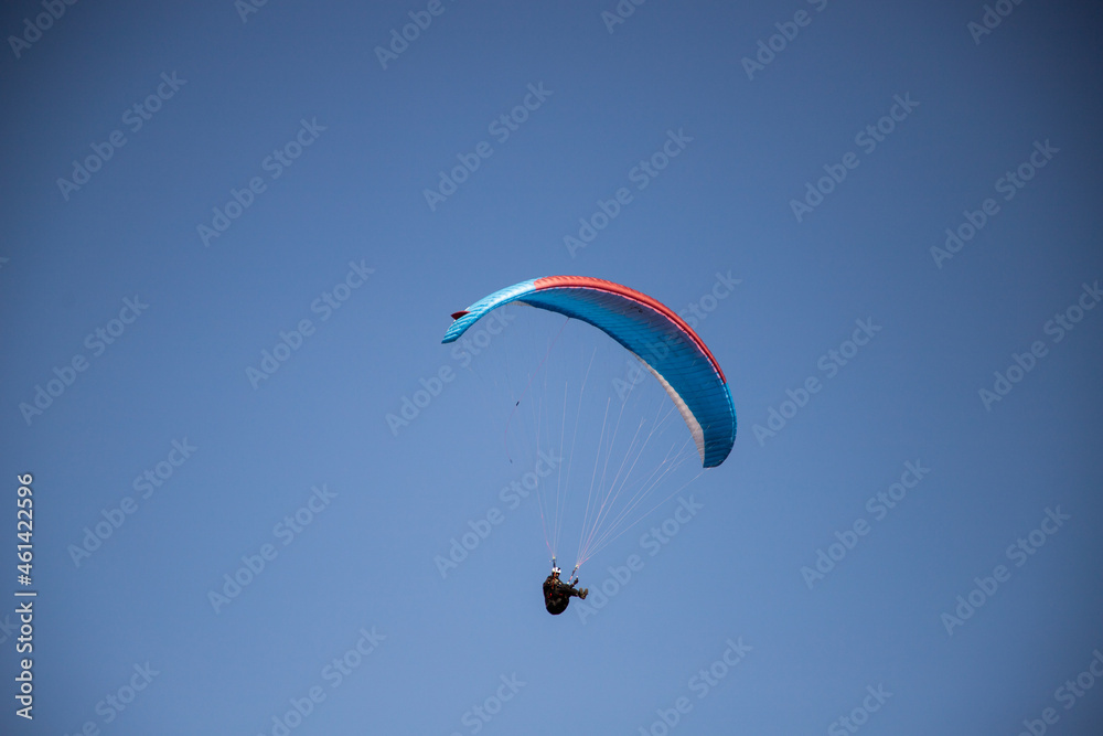 glider paragliding g against blue sky flying adrenaline and freedom concept glider paragliding g against blue sky flying adrenaline and freedom concept