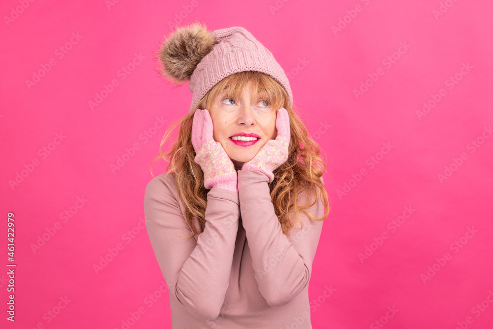 isolated senior adult woman wearing warm clothes