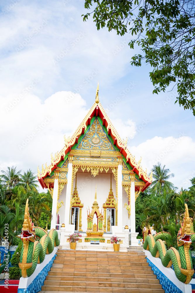 Beautiful Wat Karon Buddhist temple travel summer trip famous landmark in Thailand.