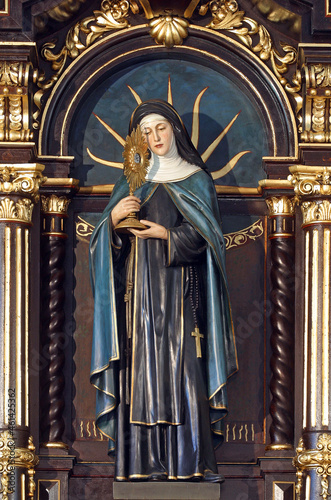 Saint Clare statue on the main altar in the church of St. Clare of Assisi in Zagreb, Croatia