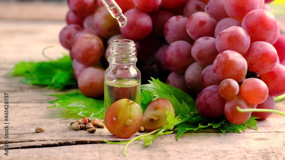 Bottle of grape seed oil. Selective focus.