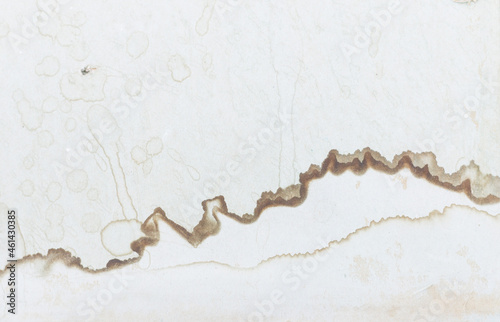 Water leakage - marks and stains on a white painted wall after rain or melting snow