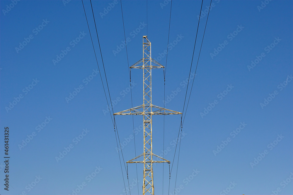 power line mast against the clear autumn sky