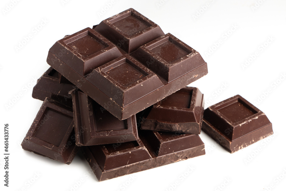 Broken pieces of dark chocolate close up Broken pieces of dark chocolate close up