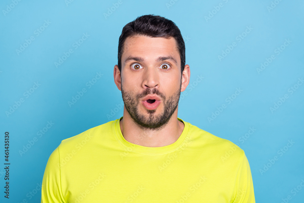 Portrait of attractive amazed guy sudden news reaction pout lips isolated over bright blue color background Portrait of attractive amazed guy sudden news reaction pout lips isolated over bright blue color background