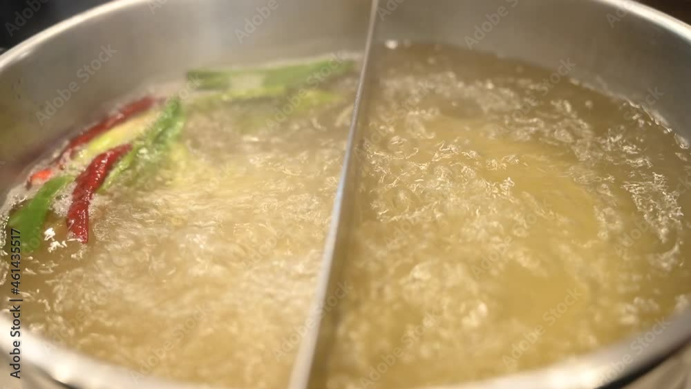 Sukiyaki or shabu and mixed vegetables in a pot of boiling soup