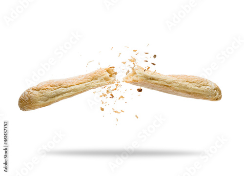 Bread jumping with crumbs on white background