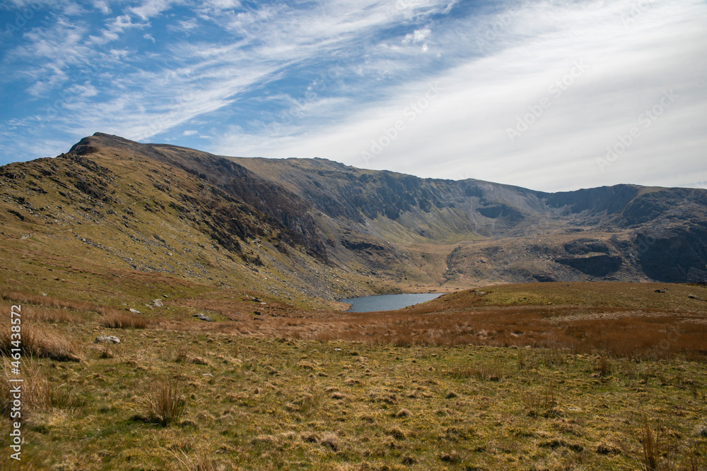 National park Snowdonia in Wales. Lakes hidden in mountain valleys.