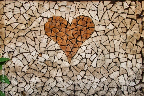 Heart shape in a piled up fire wood pile