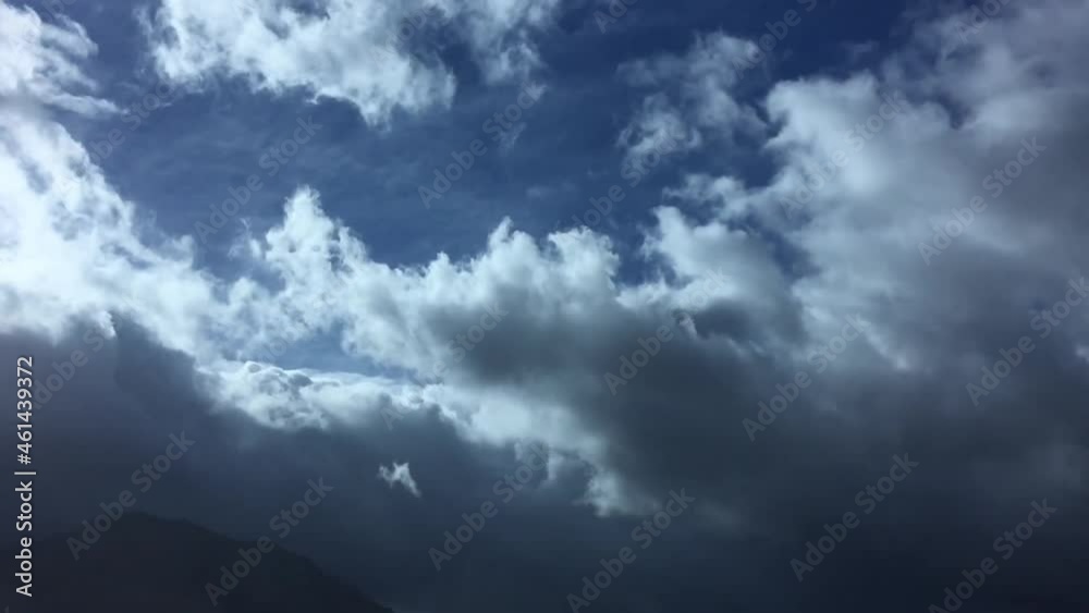 Beautiful cloud dark sky with Sunday Time lapse clouds.Clouds dark bright fluffy clouds tropical twilight.Time lapse Dark sky cloud background Slow motion. Beautiful cloud dark sky with Sunday Time lapse clouds.Clouds dark bright fluffy clouds tropical twilight.Time lapse Dark sky cloud background Slow motion.