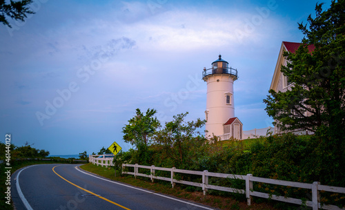 Wallpaper Mural Lighthouse and curved uphill road along the fenced meadow Torontodigital.ca