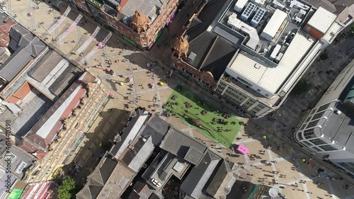 Aerial Drone Briggate shopping street in Leeds City Centre full of shoppers