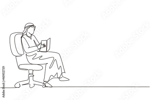 Continuous one line drawing modern young Arabian man reading book sitting in chair. Smart male reader enjoying literature, studying and preparing for exam. Single line draw design vector illustration