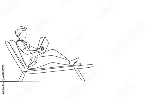 Single one line drawing reclined man reading book in lounge chair. Chill out time with good story concept. Smart male reader enjoying literature or studying. Continuous line draw design graphic vector