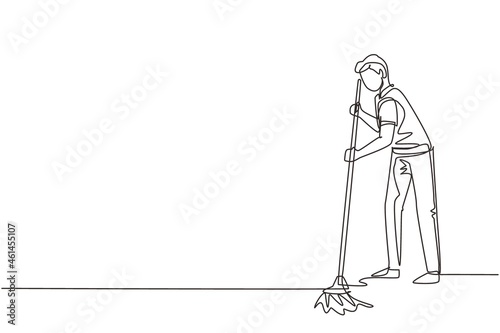 Single one line drawing young man mopping floor and cleanup indoors. Home clean, housework service or housekeeping workers and janitor. Modern continuous line draw design graphic vector illustration