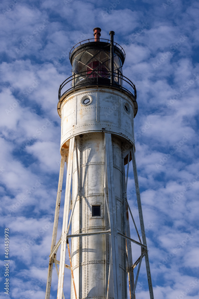 A lighthouse tower with the sky as a background. A lighthouse tower with the sky as a background.