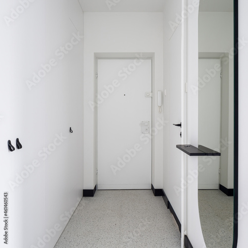 Stylish apartment corridor in white