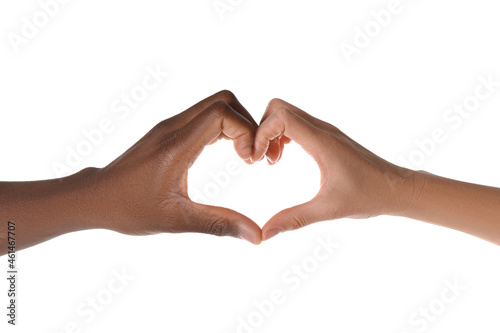 Woman and African American man making heart with hands on white background, closeup