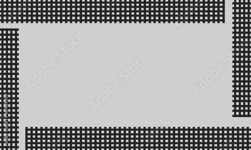 gray background in the middle of a grid of black squares
