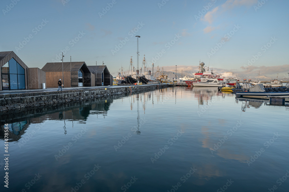 Boats and buildings reflected in the harbor at Reykjavik, Iceland