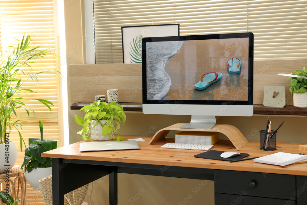 Obraz premium Comfortable workplace near window in room. Interior design