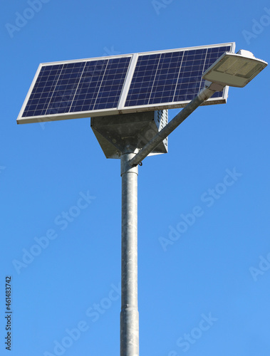 street lamp with photovoltaic panel for power supply and energy saving photo