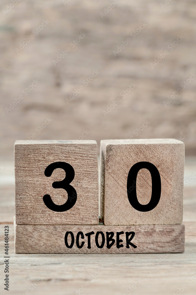cube calendar for october on wooden background with copy space cube calendar for october on wooden background with copy space