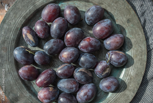 fresh plums on a plate